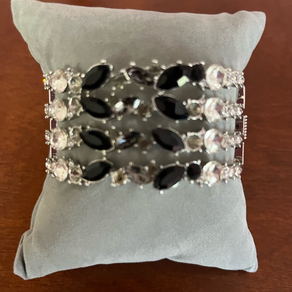 Silver tone, with faux onyx stones & rhinestone clamp, cuff bracelet.